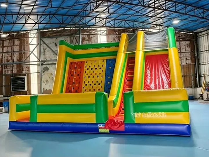 Inflatable climbing wall and slide