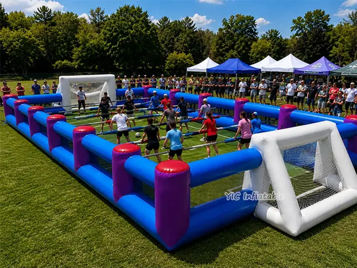 Inflatable human foosball court