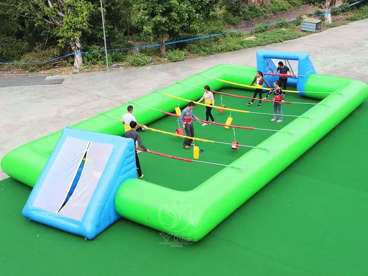 Inflatable human foosball game
