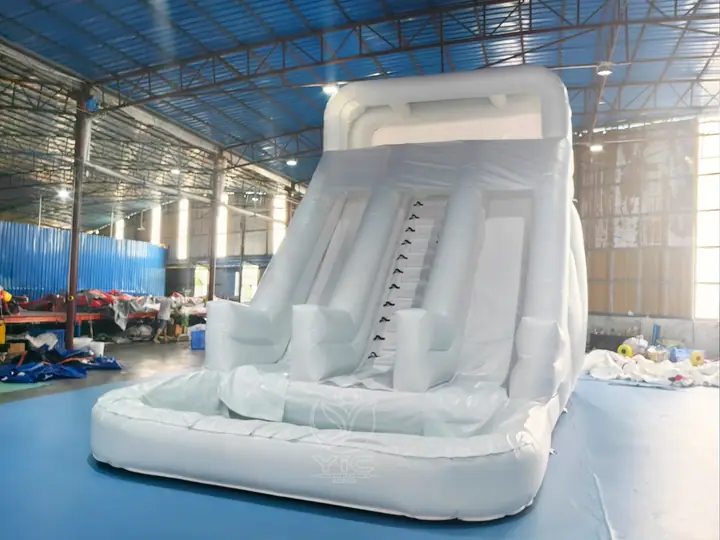 Bounce house with water slide and air blower