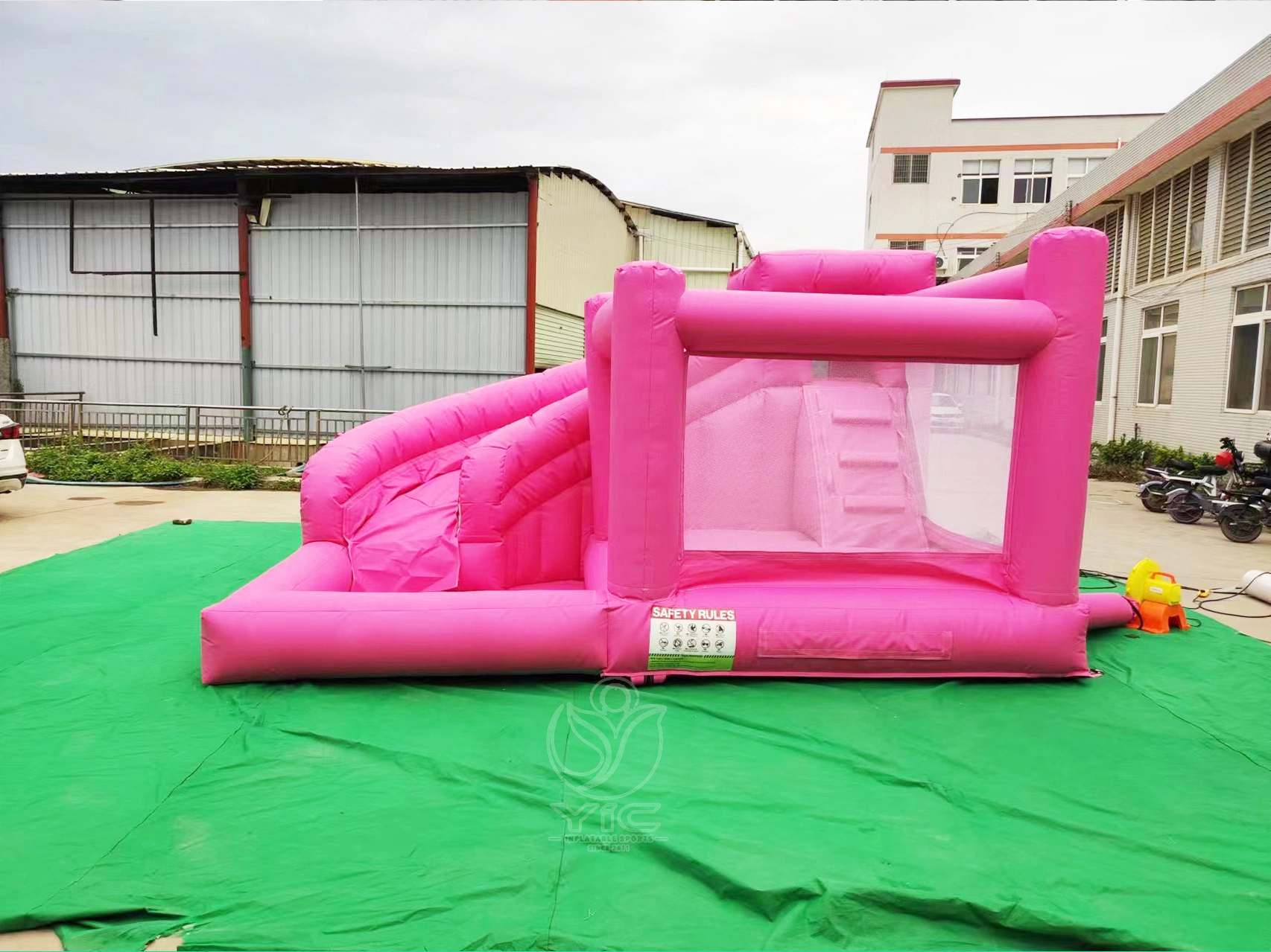 Pink bounce house with slide and ball pit product photo 2