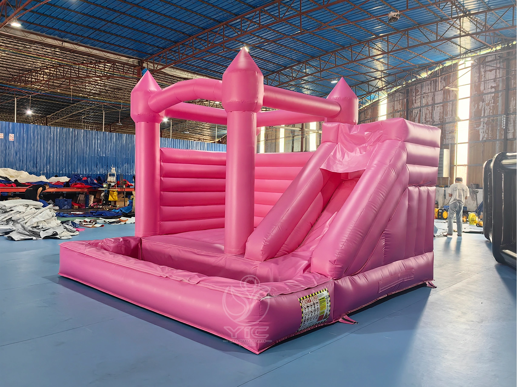 Pink bounce house with slide and ball pit product photo 2