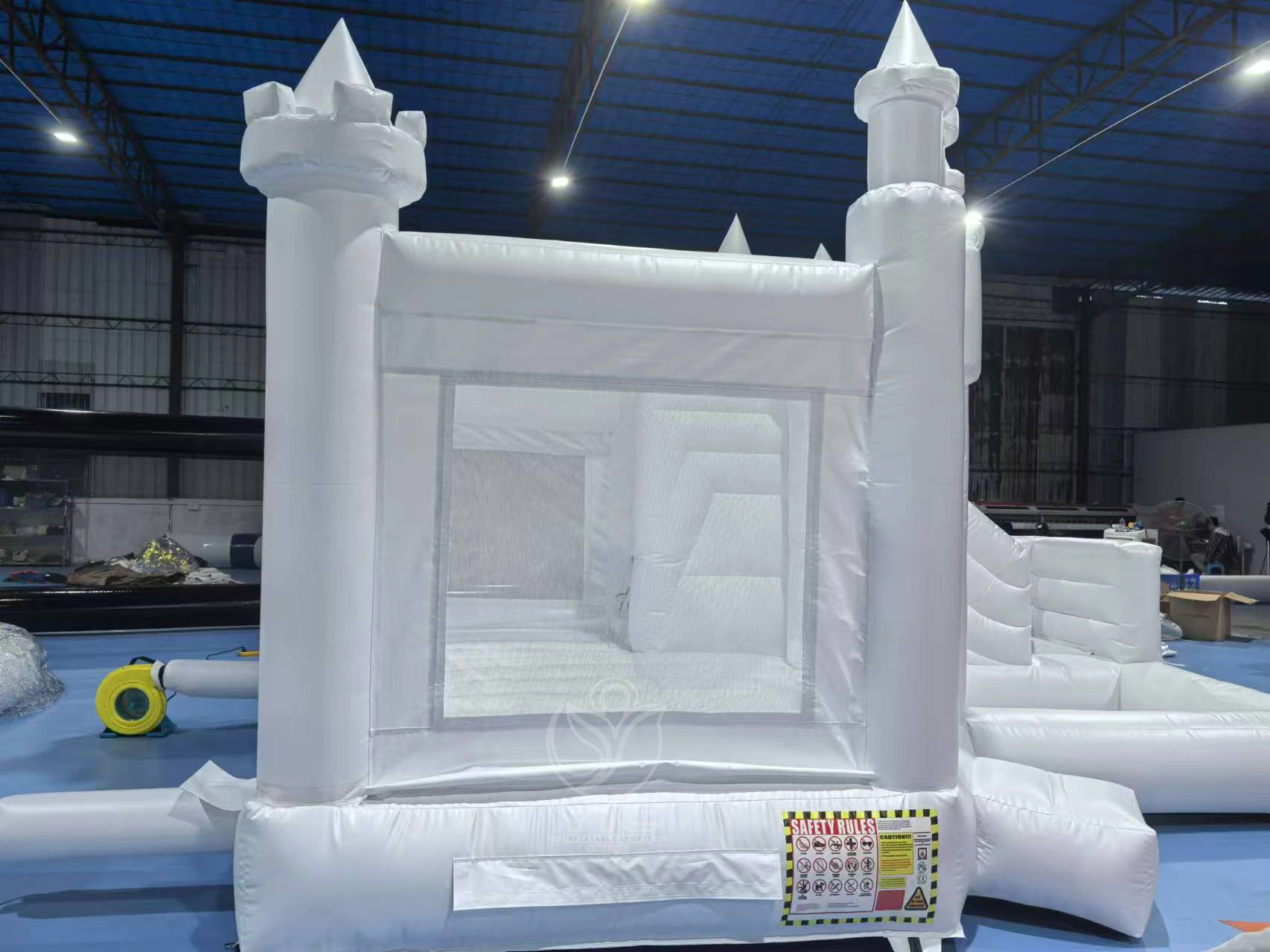 White jumping castle with slide and ball pit product photo 4