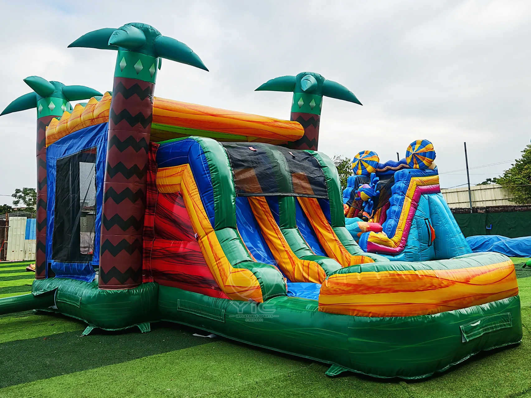 Tropical bouncy castle, a commercial bounce house combo by YIC Inflatable Sports
