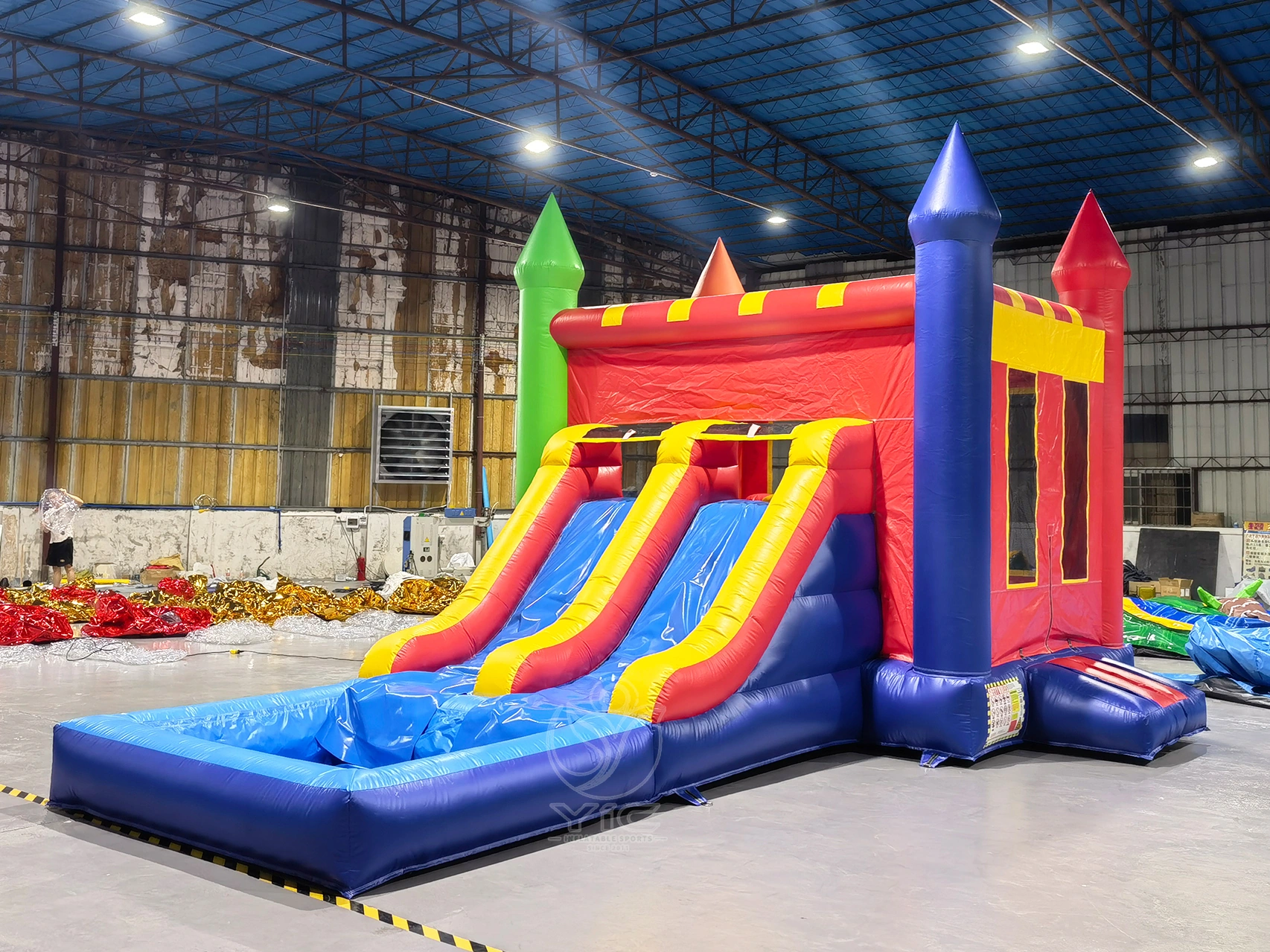 Inflatable bounce house water slide