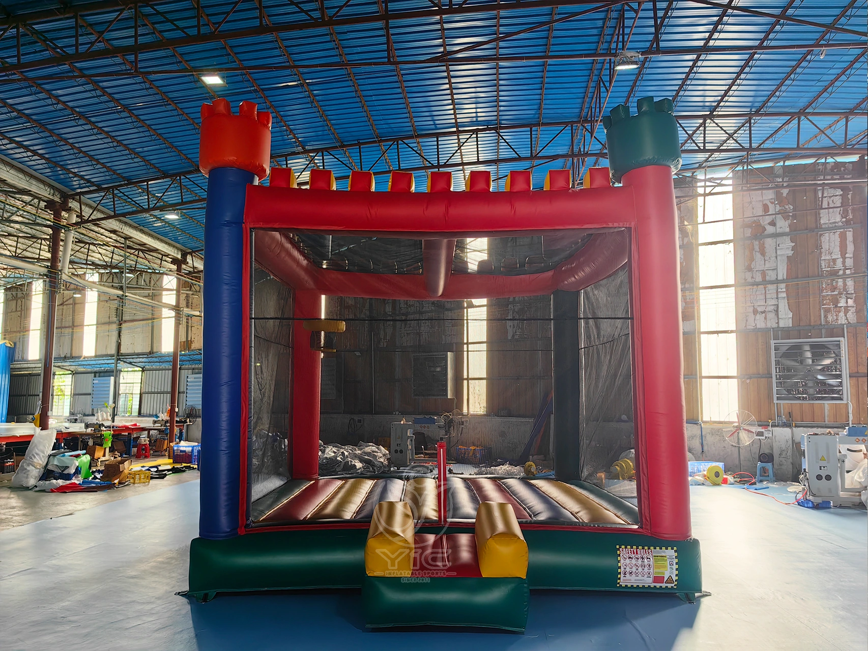 Bounce house with basketball hoop inside product photo 2