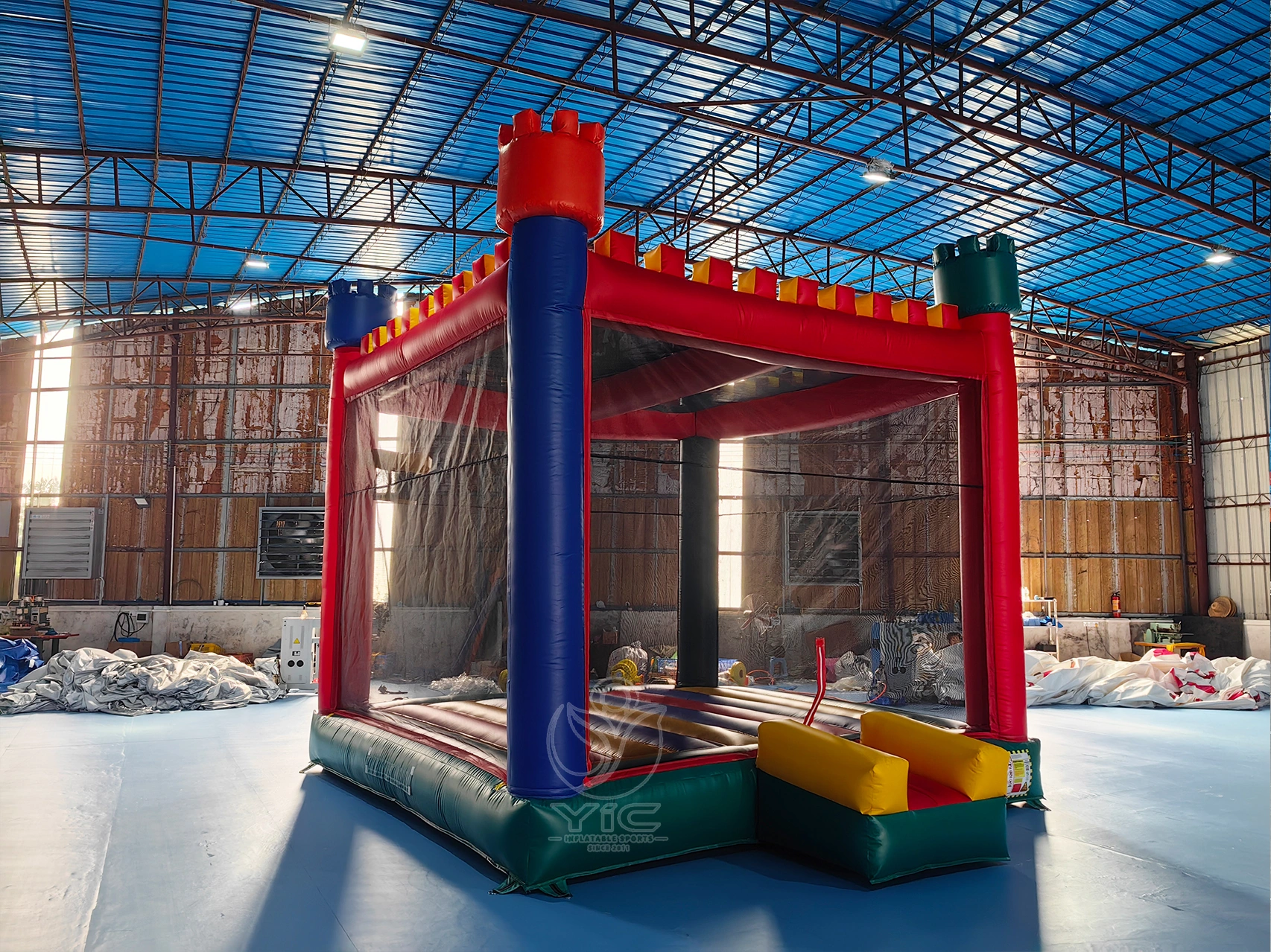 Bounce house with basketball hoop inside product photo 3