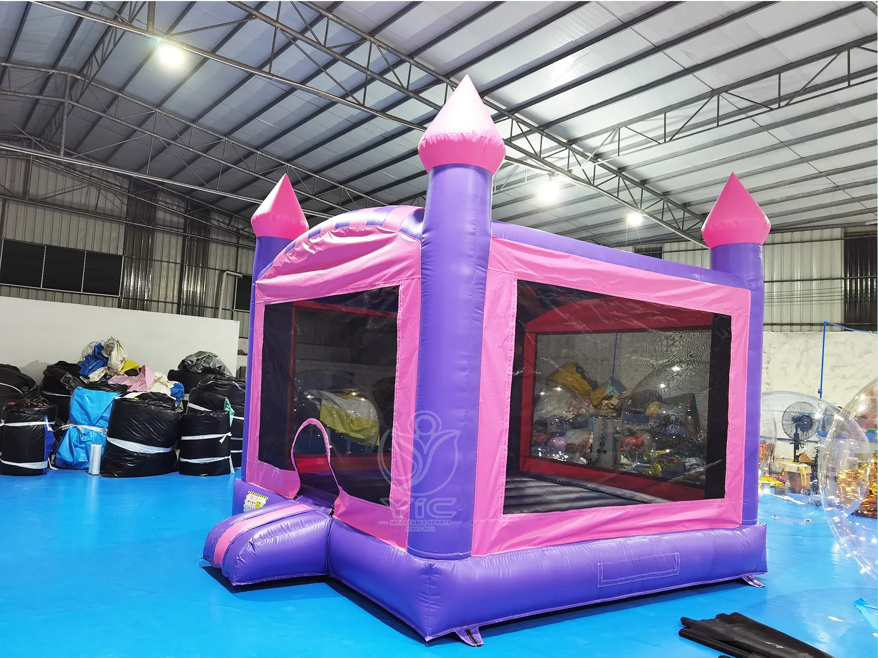 Pink and purple bounce house product photo 2