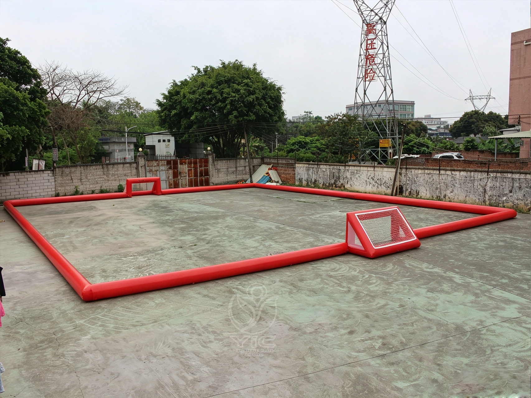 Portable inflatable soccer field