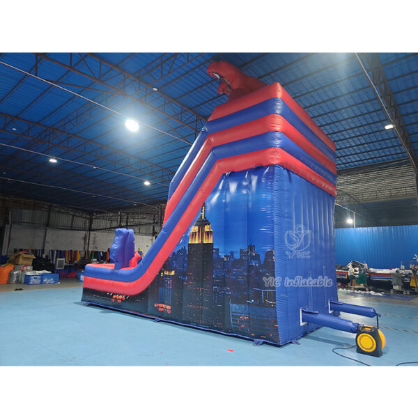 commercial Side view of superhero inflatable bounce house slide combo with safety netting by YIC factory